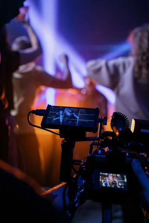 Cinematic camera rig filming on a live production set
